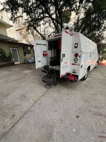 Magnet Plumbing service vehicle on-site for Sewer Line Repair in Wilshire Center